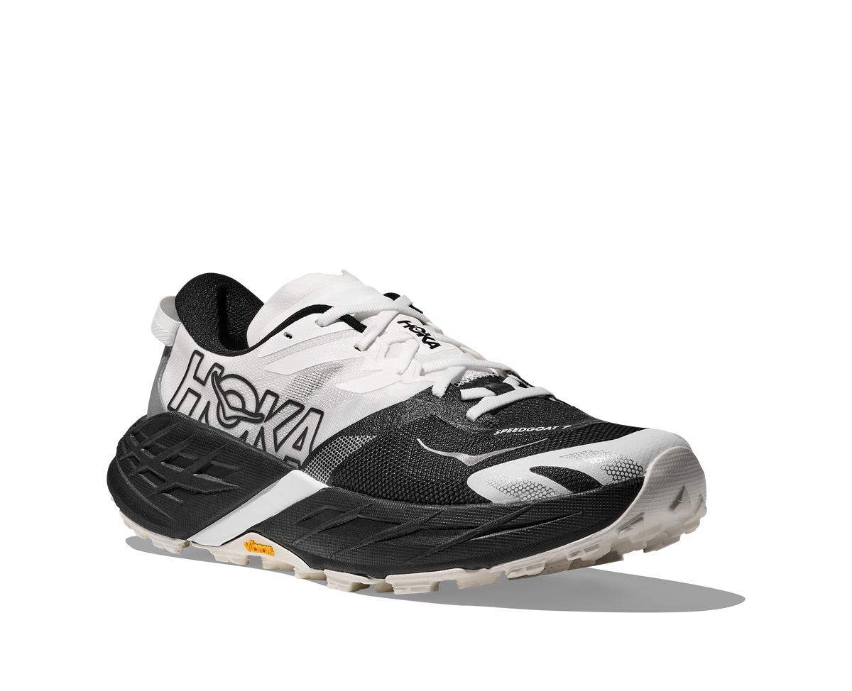 Men's Hoka Speedgoat 7. White/Black upper. Black midsole. Lateral view.