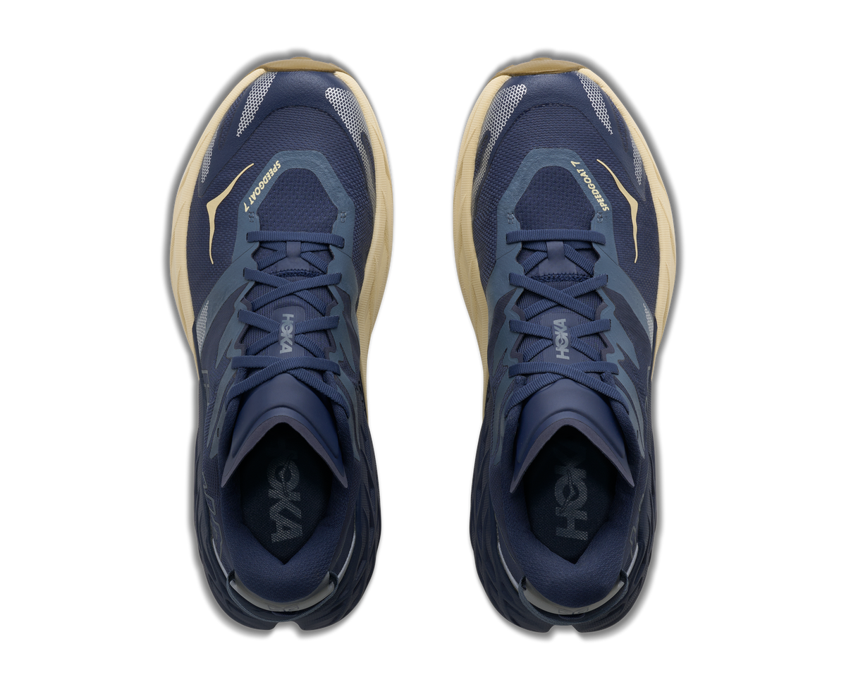 Men's HOKA Speedgoat 7 in Varsity Navy/Barley Flour, top view.