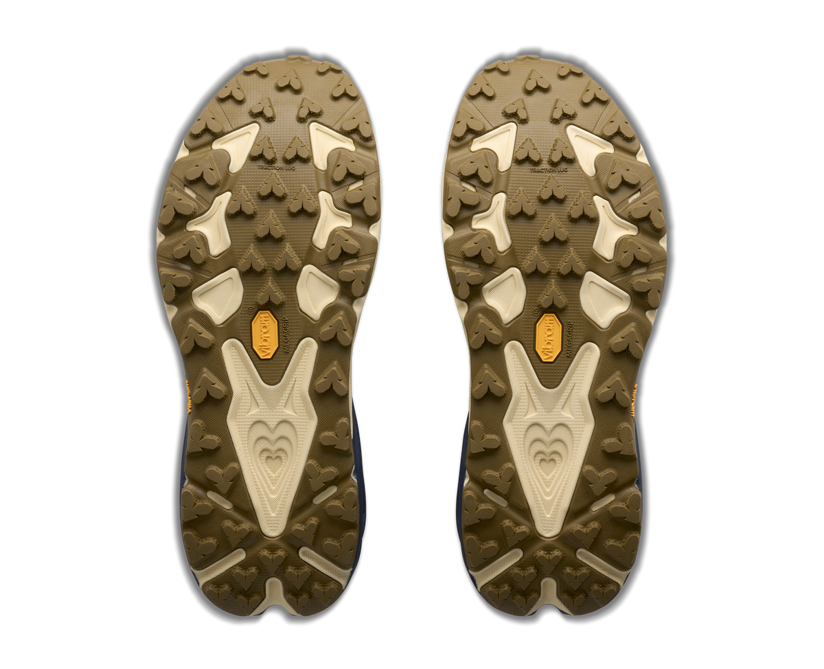 Men's HOKA Speedgoat 7 in Varsity Navy/Barley Flour, outsole view.