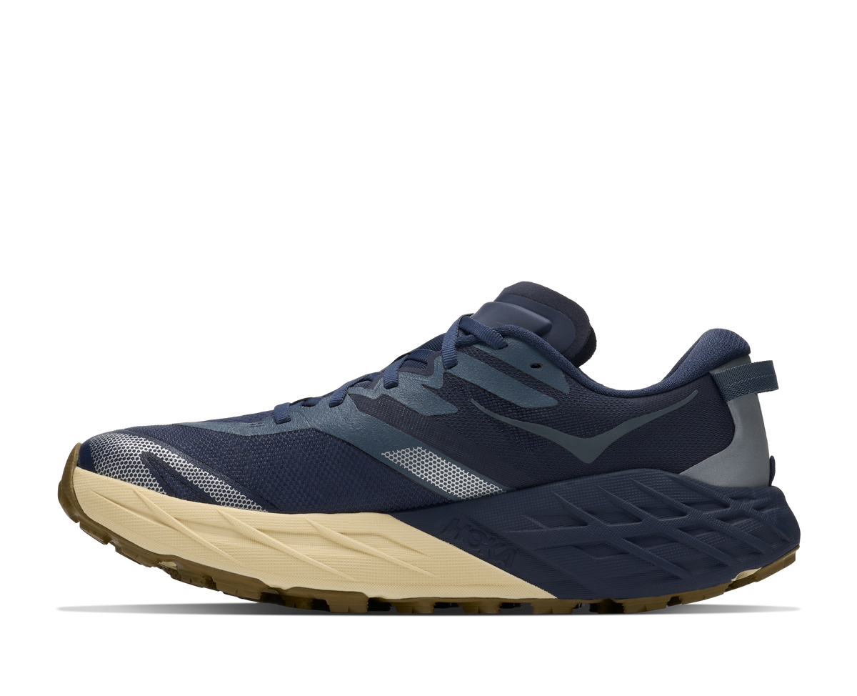Men's HOKA Speedgoat 7 in Varsity Navy/Barley Flour, medial view.