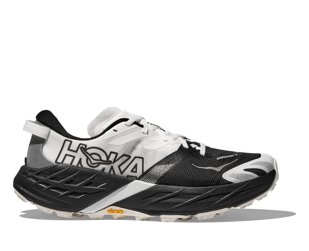 Women's Hoka Speedgoat 7. White/Black upper. Black midsole. Lateral view.