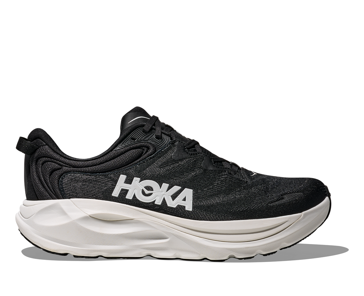 Men's Hoka Gaviota 6. Black upper. White midsole. Lateral view.