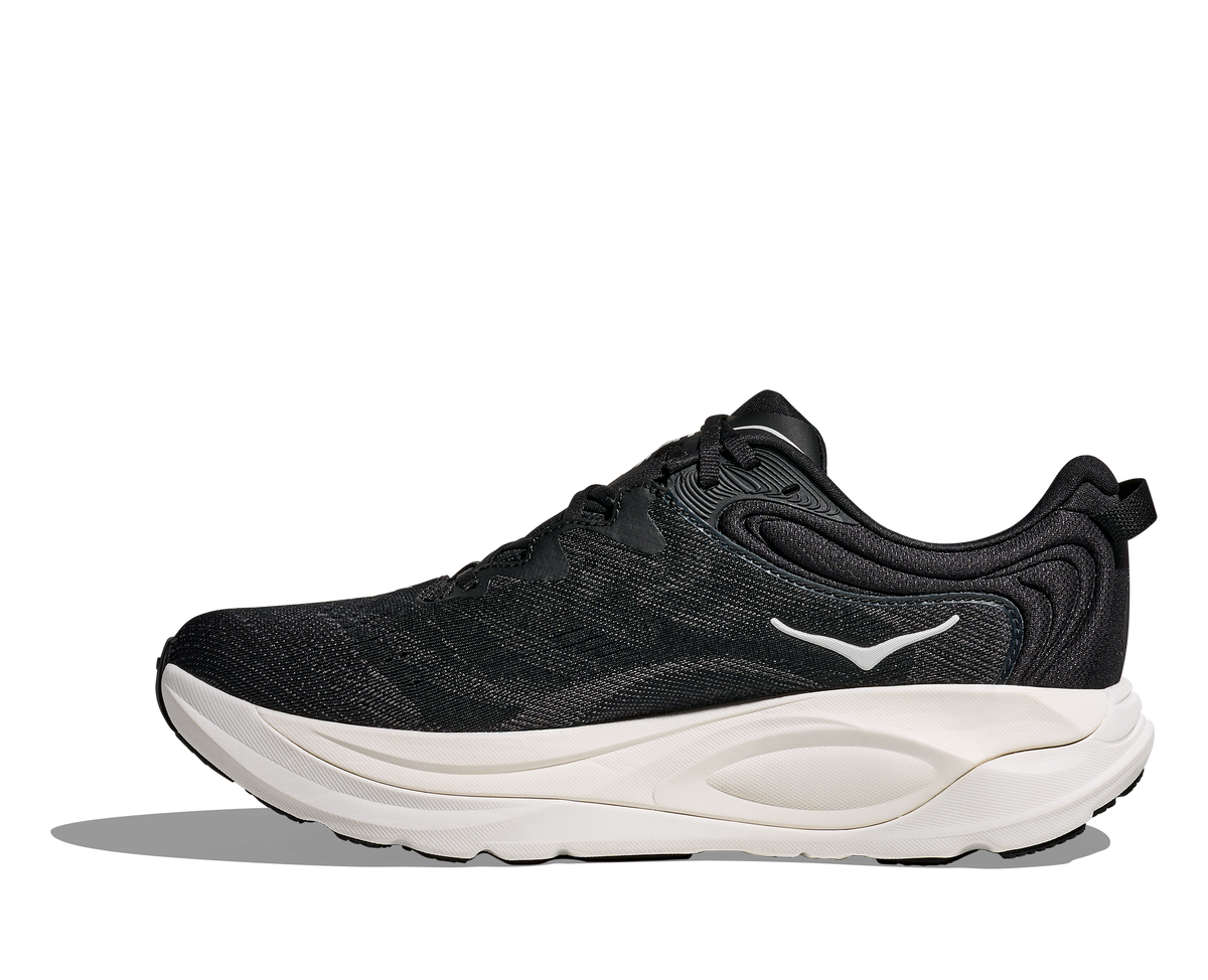 Men's Hoka Gaviota 6. Black upper. White midsole. Medial view.