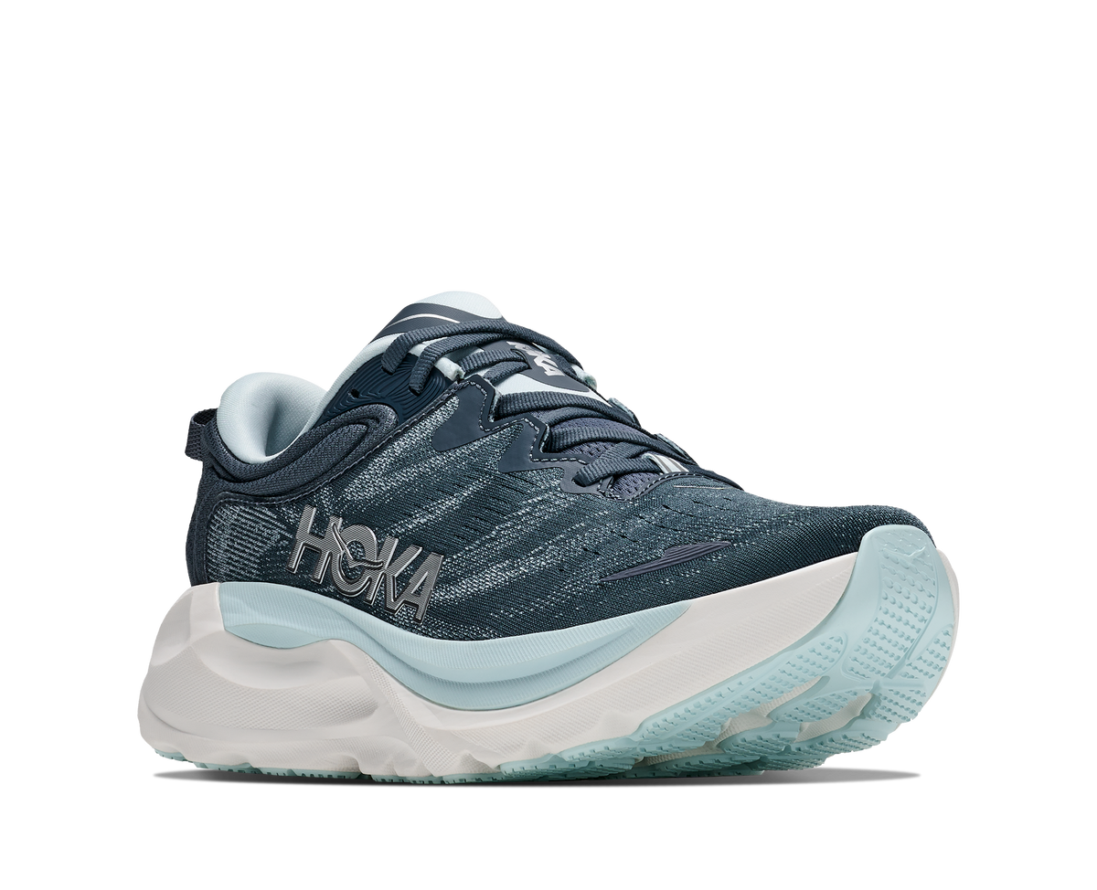 Women's Hoka Gaviota 6. Dark Navy upper. White midsole. Lateral view.