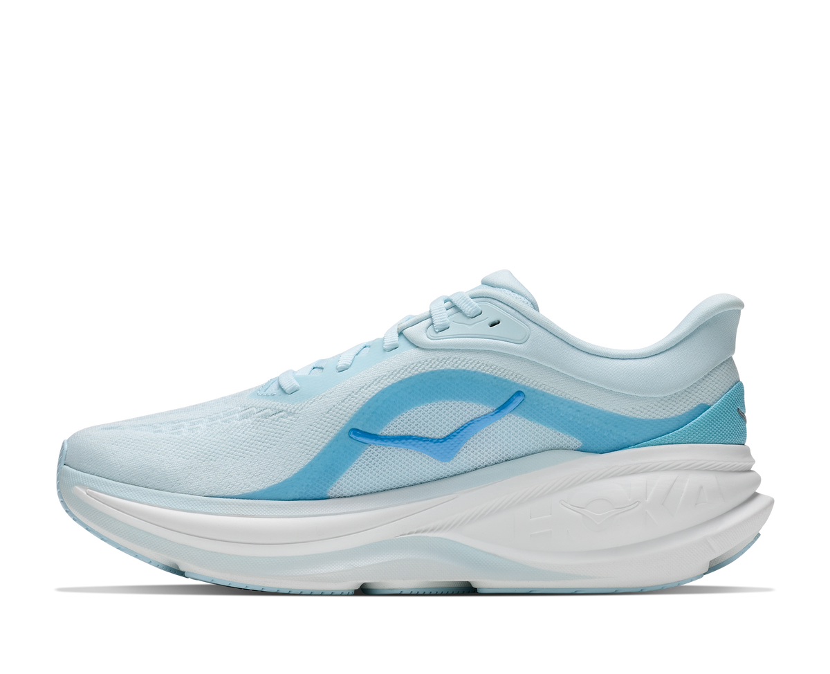 Women's Hoka Clifton Pro. Light Blue upper. White midsole. Medial view.