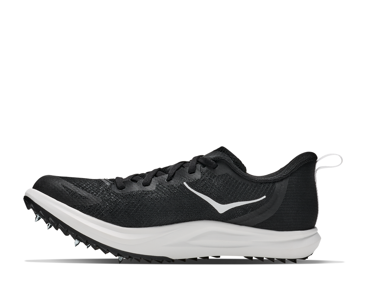 Hoka Crescendo XC 2. Black upper. White midsole. Medial view.