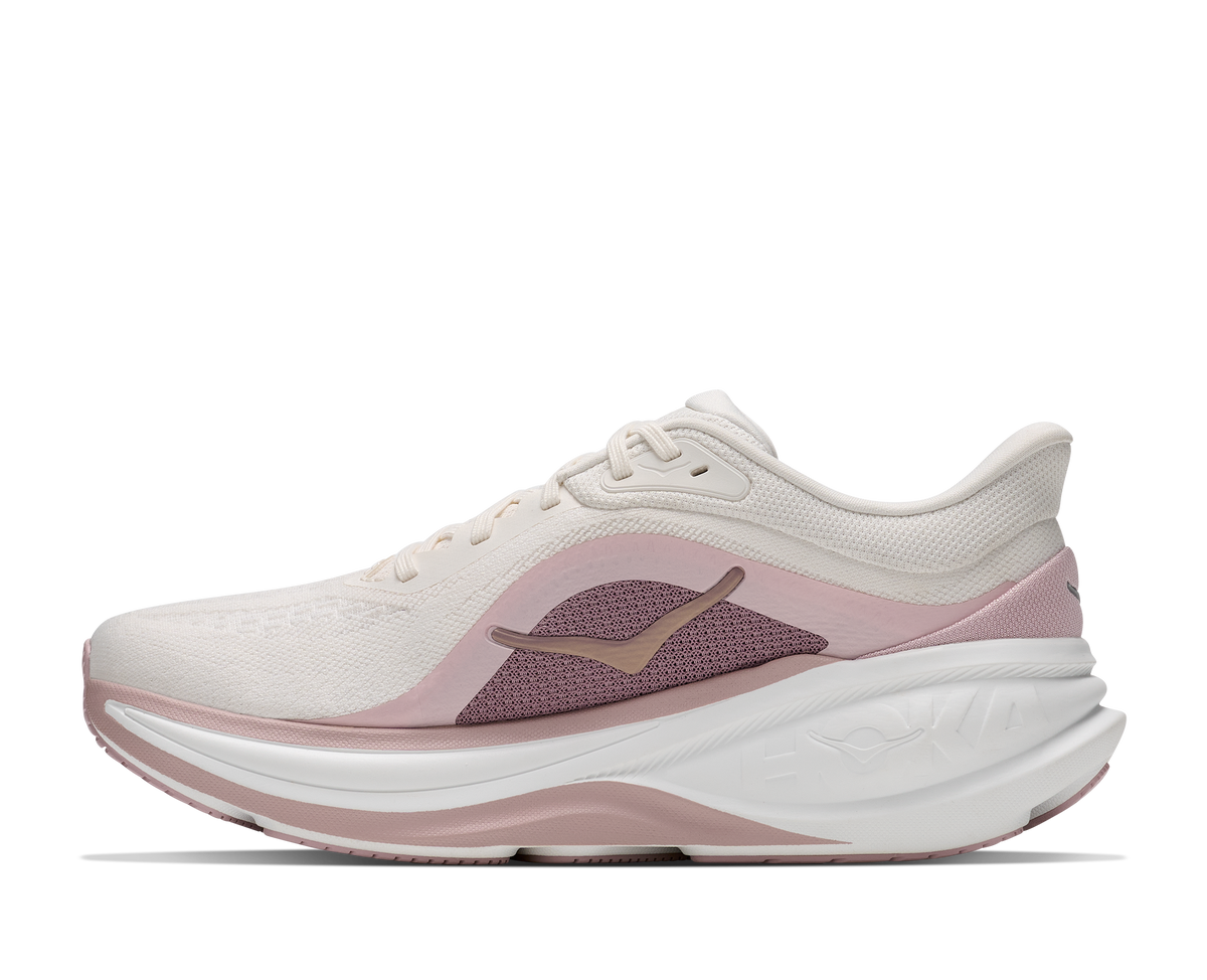 Women's HOKA Clifton Pro in Alabaster/Pink Opal, medial view.