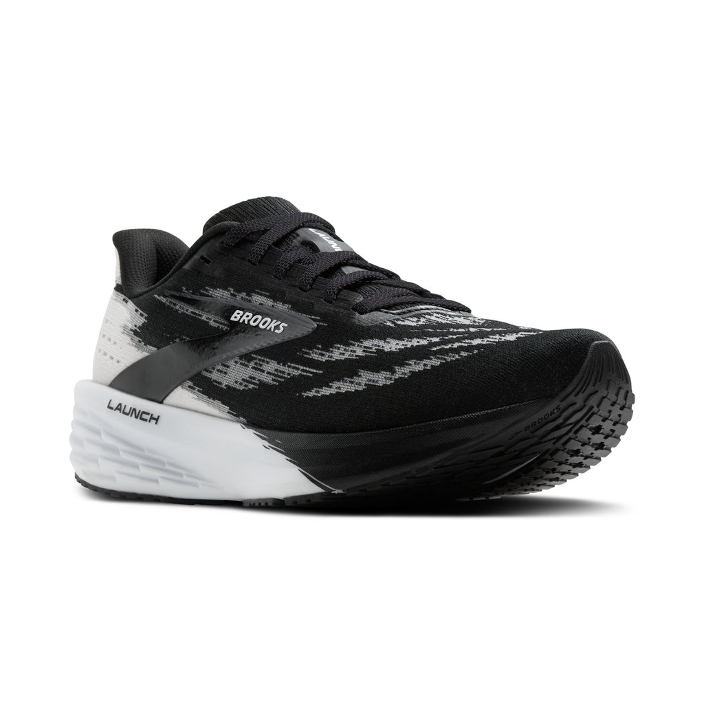 Women's Brooks Launch 11. Black/White upper. Black/White midsole. Lateral view.