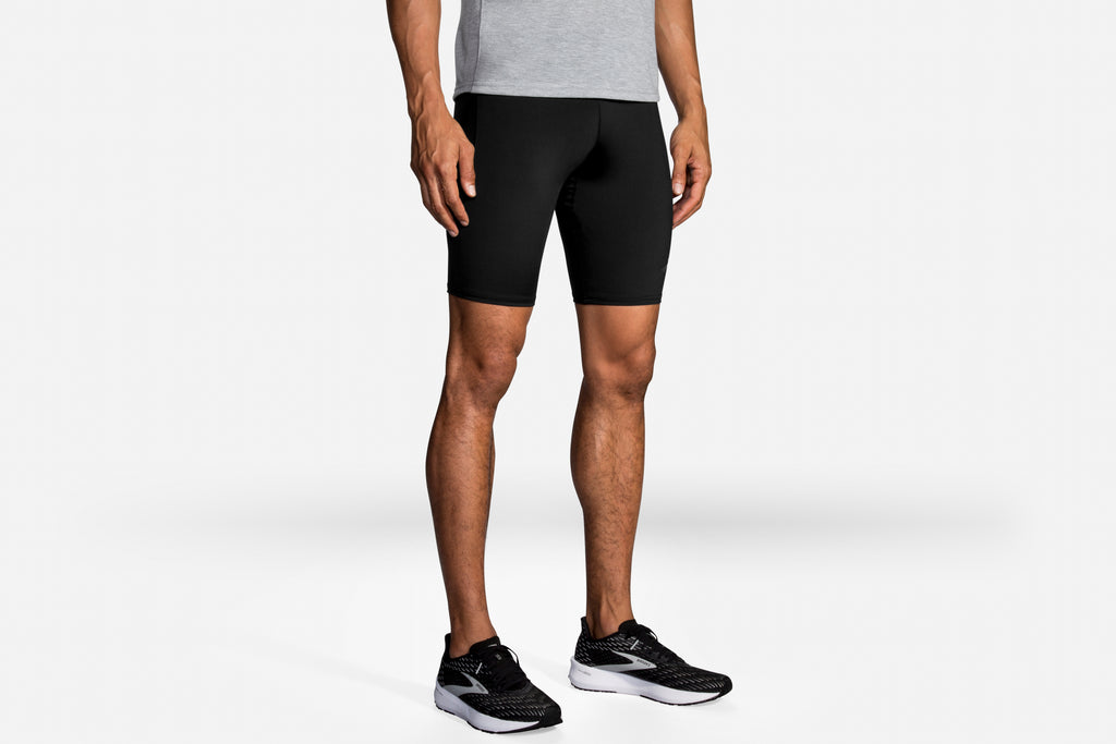 Men's Brooks Source 9" Tights. Black. Front view.