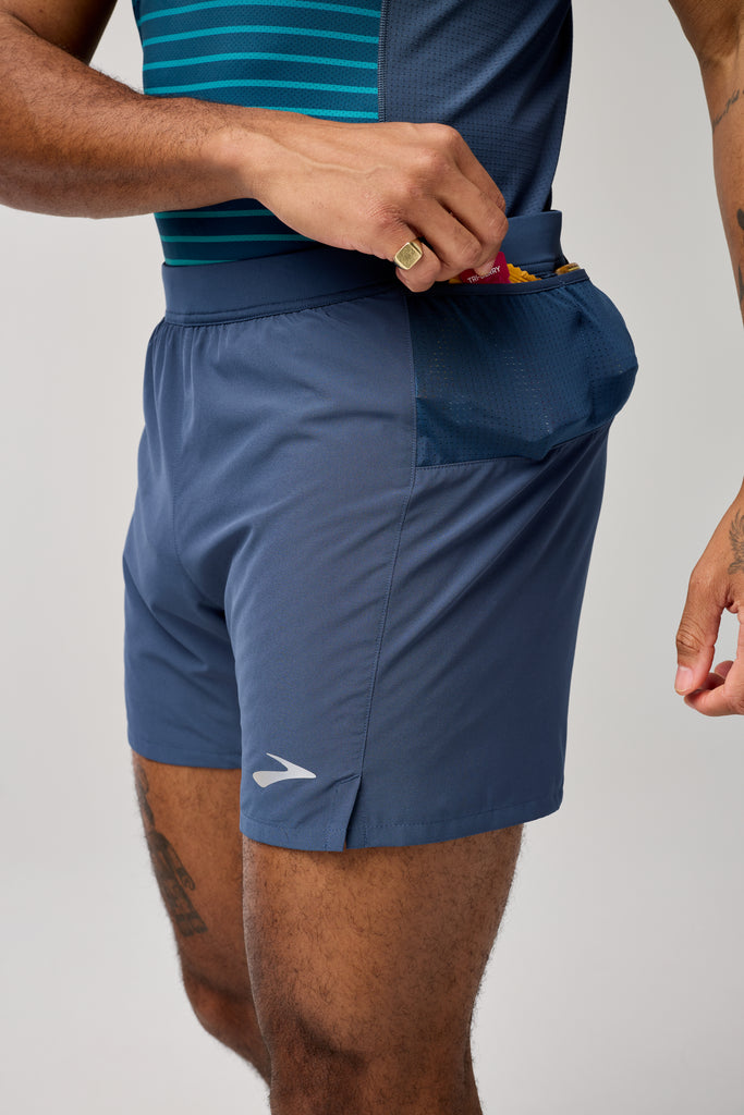 Men's Brooks Journey Shorts. Grey/Blue. Front/Lateral view.
