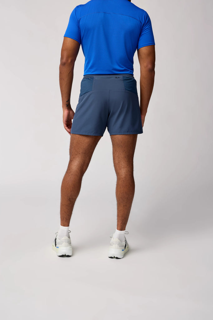Men's Brooks Journey Shorts. Grey/Blue. Rear view.