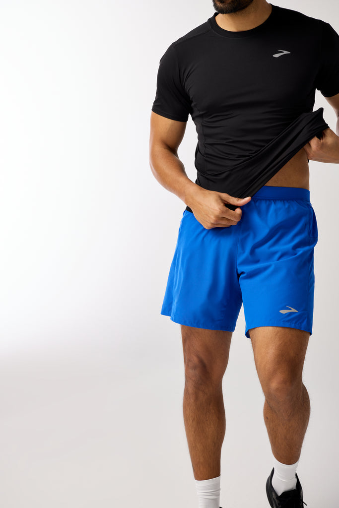 Men's Brooks Journey 7" Shorts. Blue. Front view.