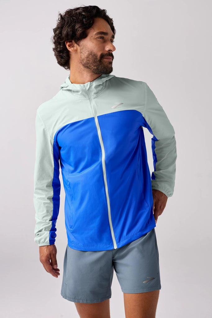 Men's Brooks Canopy Jacket. White/Blue. Front view.