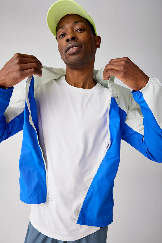 Men's Brooks Canopy Jacket. White/Blue. Front view.