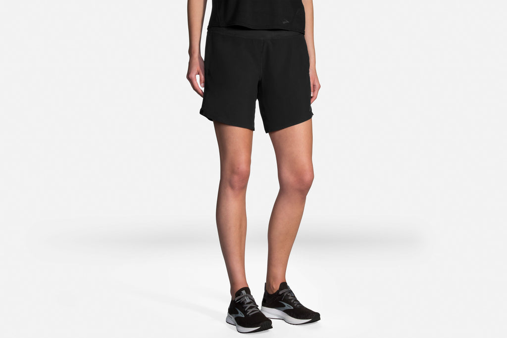 Women's Brooks Chaser 7" Shorts. Black. Front view.