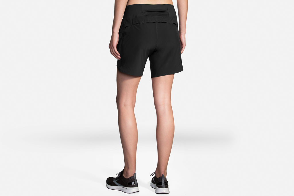 Women's Brooks Chaser 7" Shorts. Black. Rear view.