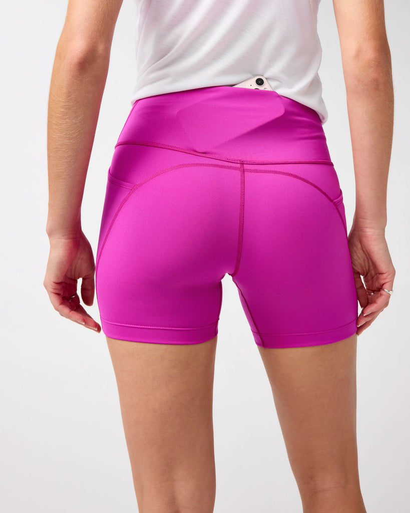 Women's Brooks Spark 5" Short Tights. Magenta.