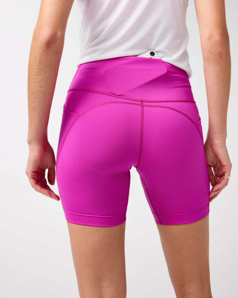 Women's Brooks Spark 8" Short Tights. Magenta.