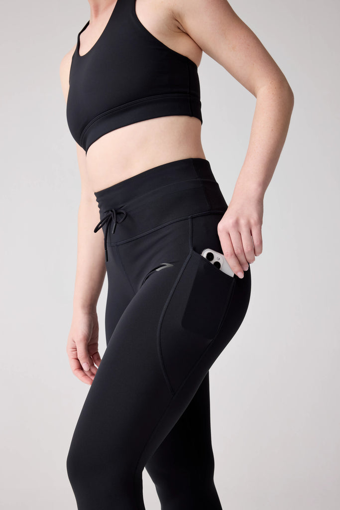 Women's Brooks Luxe Tights. Black.