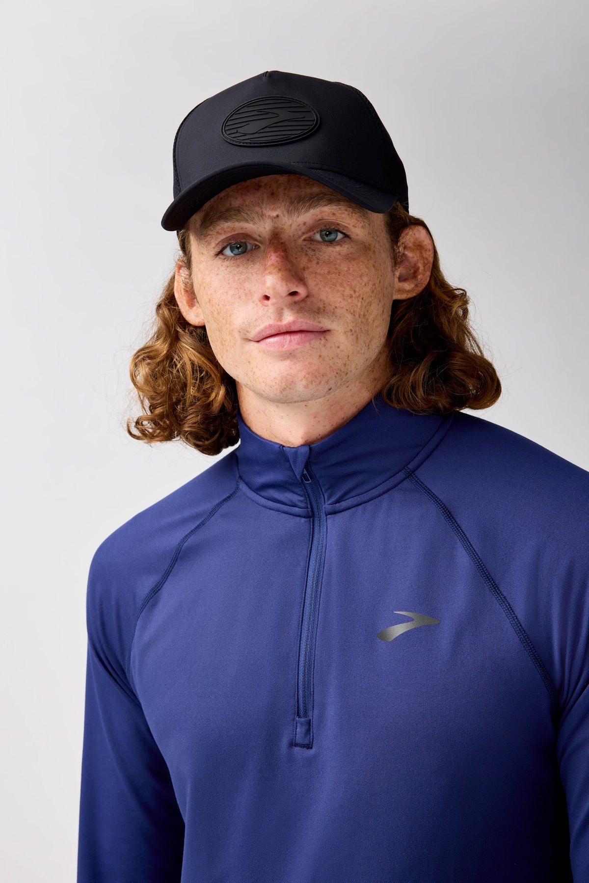 Brooks Surge Trucker Hat. Black.