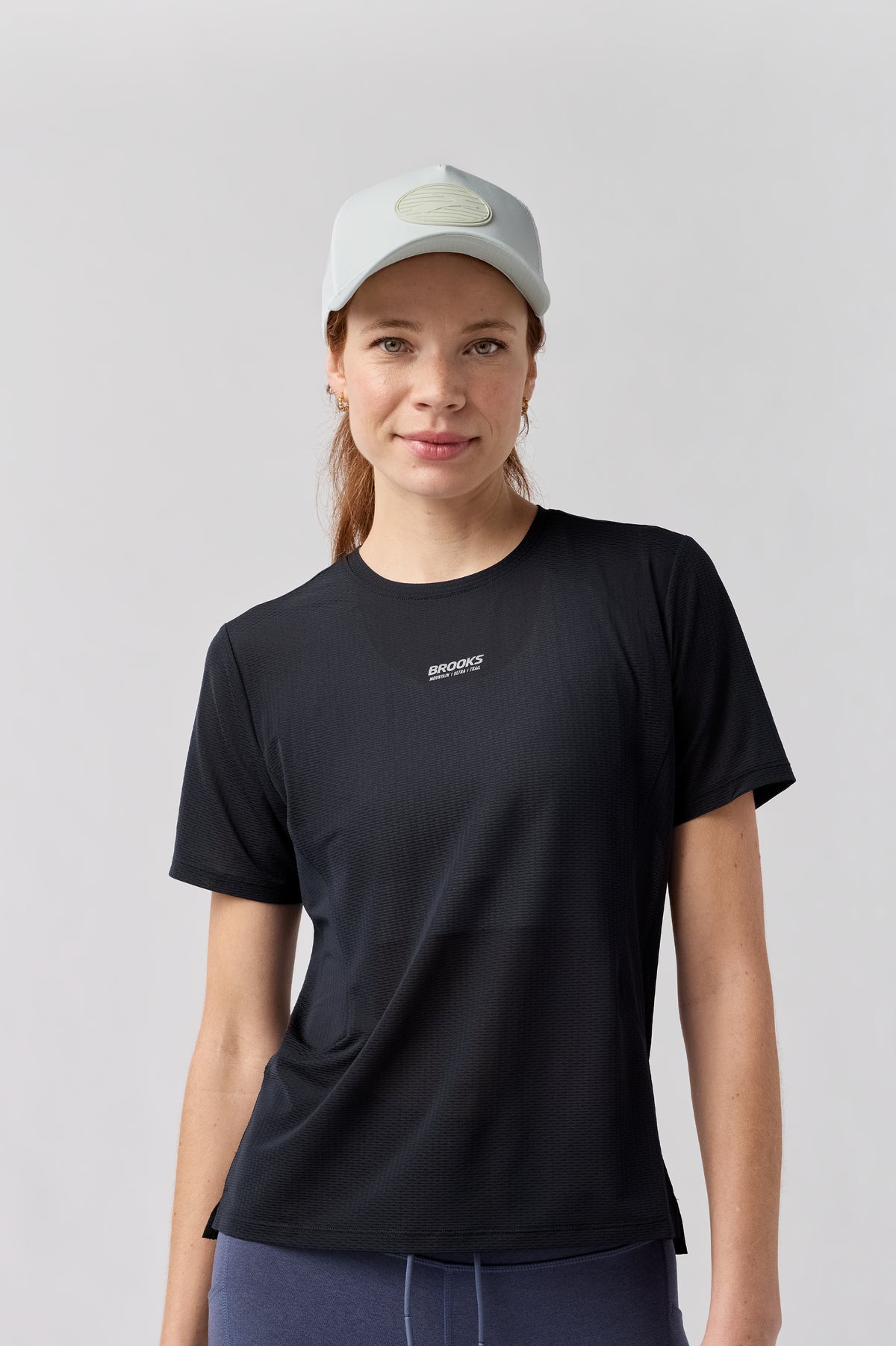 Brooks Surge Trucker Hat. White.