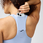 Women's Brooks Luxe Pocket Sports Bra in Heather Halogen Blue, detail view