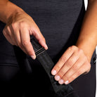 Women's Brooks Convertible 2.0 Sports Bra in Black, strap detail.