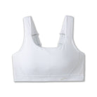 Women's Brooks Convertible 2.0 Sports Bra in White, lifestyle view.