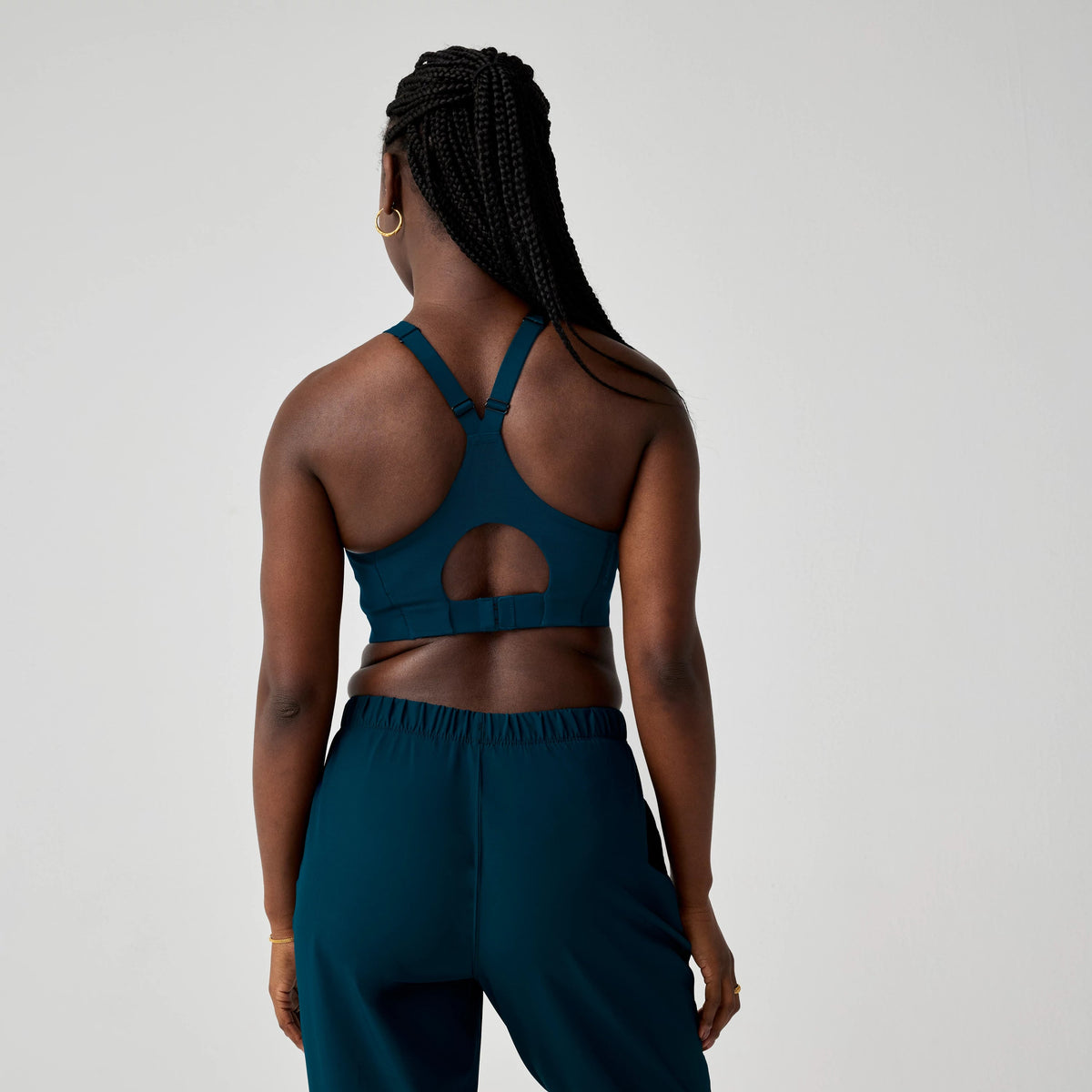 Women's Brooks Limitless Racerback Sports Bra in Cosmo, back view.