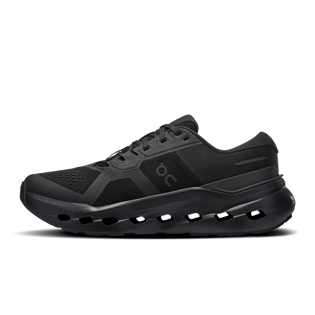 Men's On Running Cloudrunner 3. Black upper. Black midsole. Medial view.