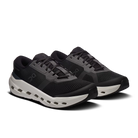 Men's On Running Cloudrunner 3. Black upper. White midsole. Lateral view.