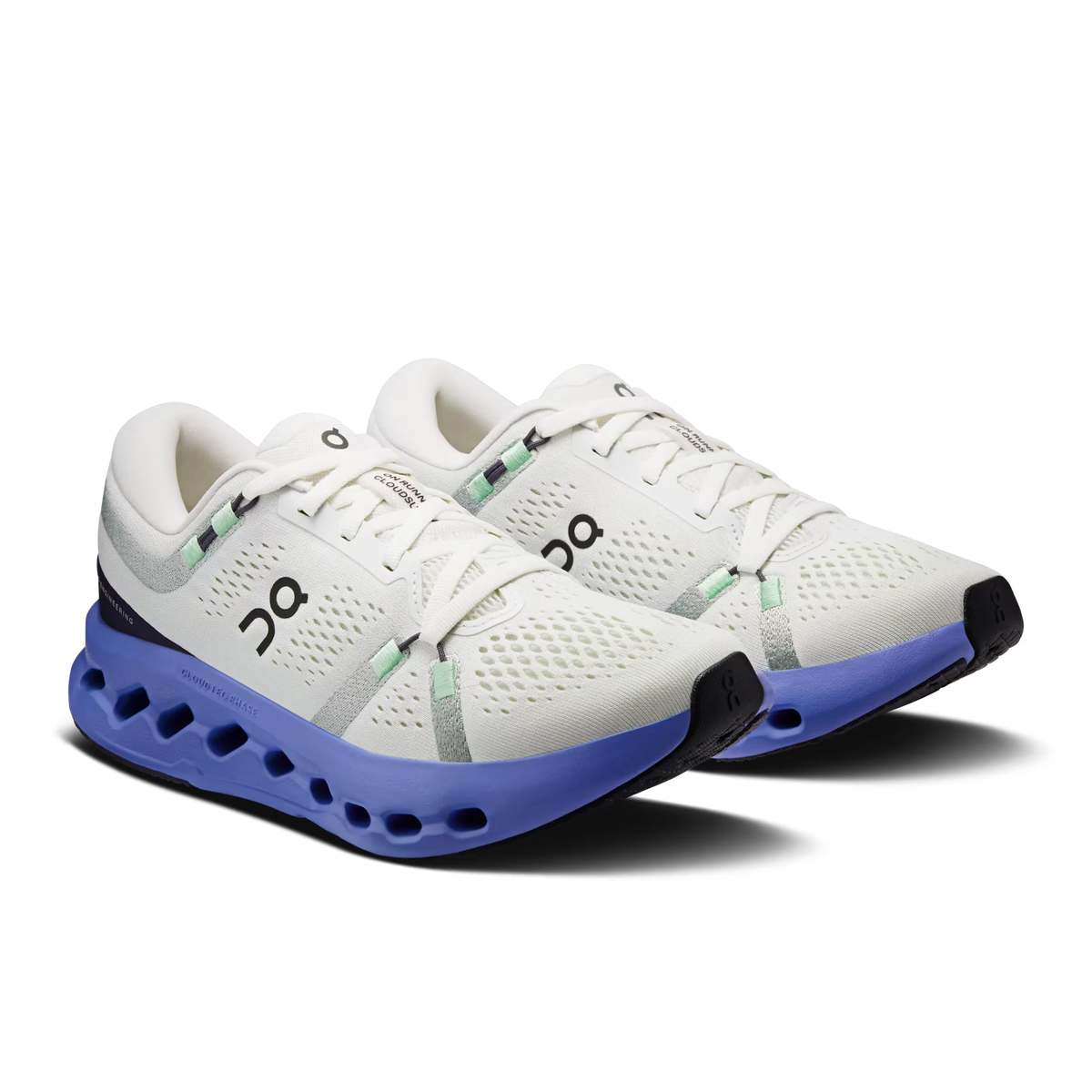 Women's On Cloudsurfer 2. White upper. Blue midsole. Lateral view.