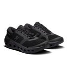 Women's On Running Cloudrunner 3. Black upper. Black midsole. Lateral view.