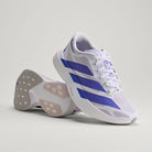 Adidas Adizero Evo SL EXO women's running shoe in Silver Dawn/Solar Purple/Frozen Purple — angled pair with outsole visible