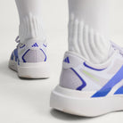 Adidas Adizero Evo SL EXO women's running shoe in Silver Dawn/Solar Purple/Frozen Purple — heel detail on foot