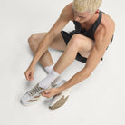 Adidas Adizero Evo SL Woven men's running shoe in Grey One/Grey One/Khaki Six — top view while tying laces