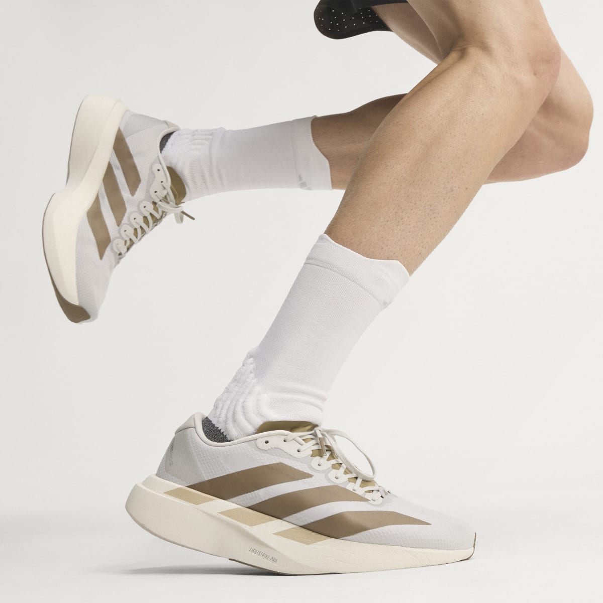 Adidas Adizero Evo SL Woven men's running shoe in Grey One/Grey One/Khaki Six — on-foot side view