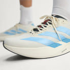 Adidas Adizero Evo SL Woven women's running shoe in Off White/Light Blue/Off White — upper and lacing detail