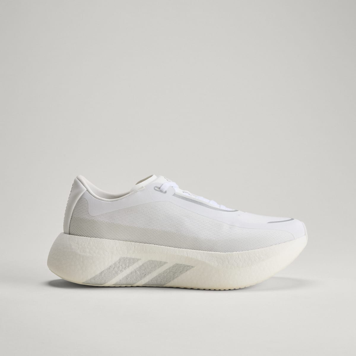 Adidas Hyperboost Edge men's running shoe in Cloud White/Silver Metallic/Zero Metallic — side profile.