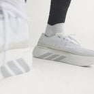 Adidas Hyperboost Edge men's running shoe in Cloud White/Silver Metallic/Zero Metallic — on-foot side detail.