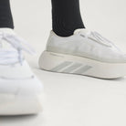 Adidas Hyperboost Edge women's running shoe in Cloud White/Silver Metallic/Zero Metalic — on-foot side detail