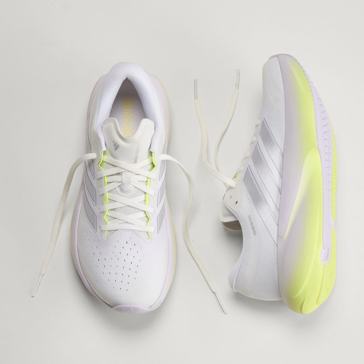 Adidas Supernova Rise 3 women's running shoe in Crystal White/Silver Metallic/Purple Tint — top and opposite side views
