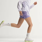 Adidas Supernova Rise 3 women's running shoe in Crystal White/Silver Metallic/Purple Tint — running lifestyle view