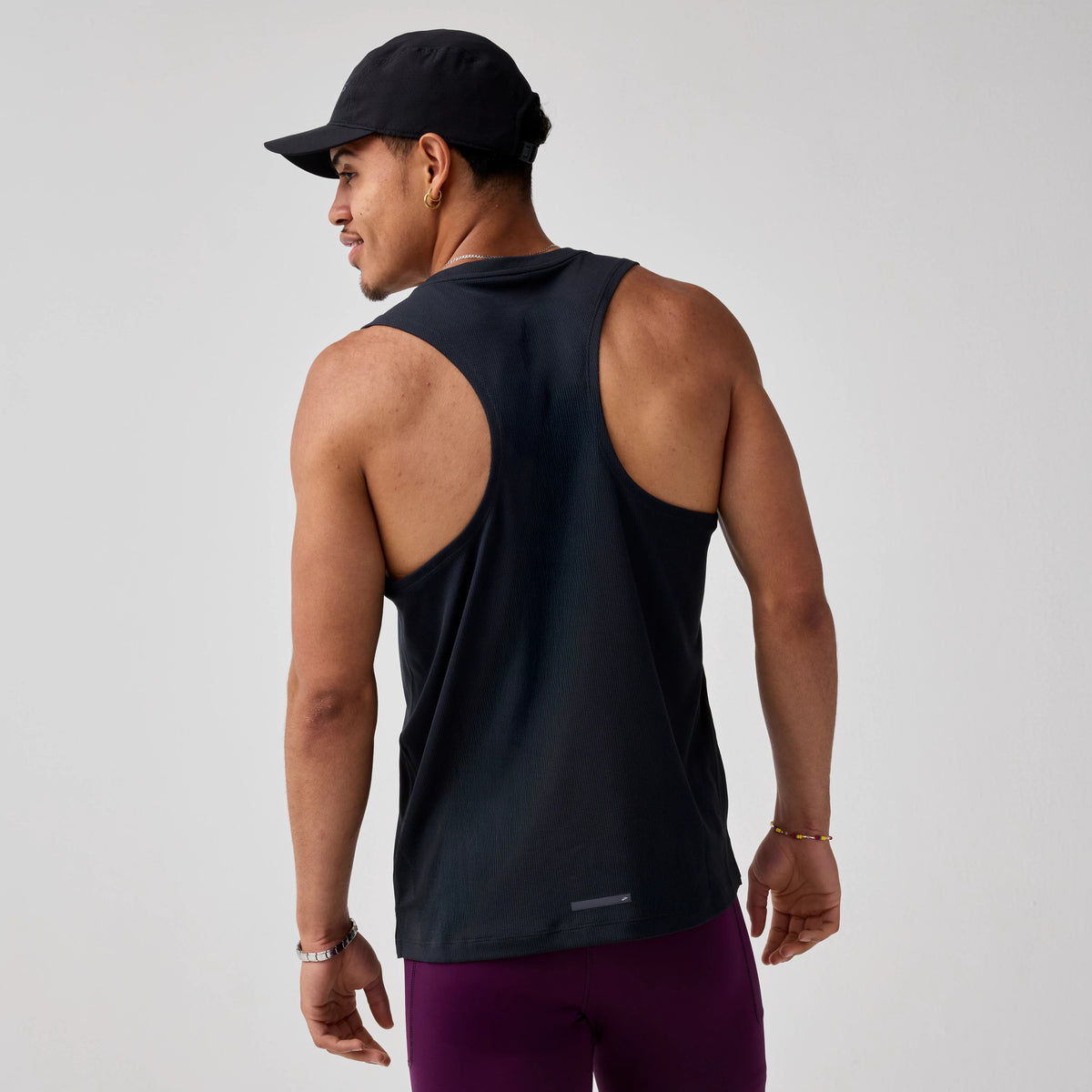 Brooks Dash Singlet for men in Black, back model view.