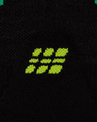 CEP Core Run Merino Mid Cut Compression Sock in Black/Lime, logo knit detail