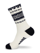 Dale of Norway Cortina unisex crew socks in off-white and navy, single sock showing the patterned cuff, heel and toe