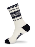 Dale of Norway Cortina unisex crew socks in off-white and navy, single sock showing the patterned cuff, heel and toe