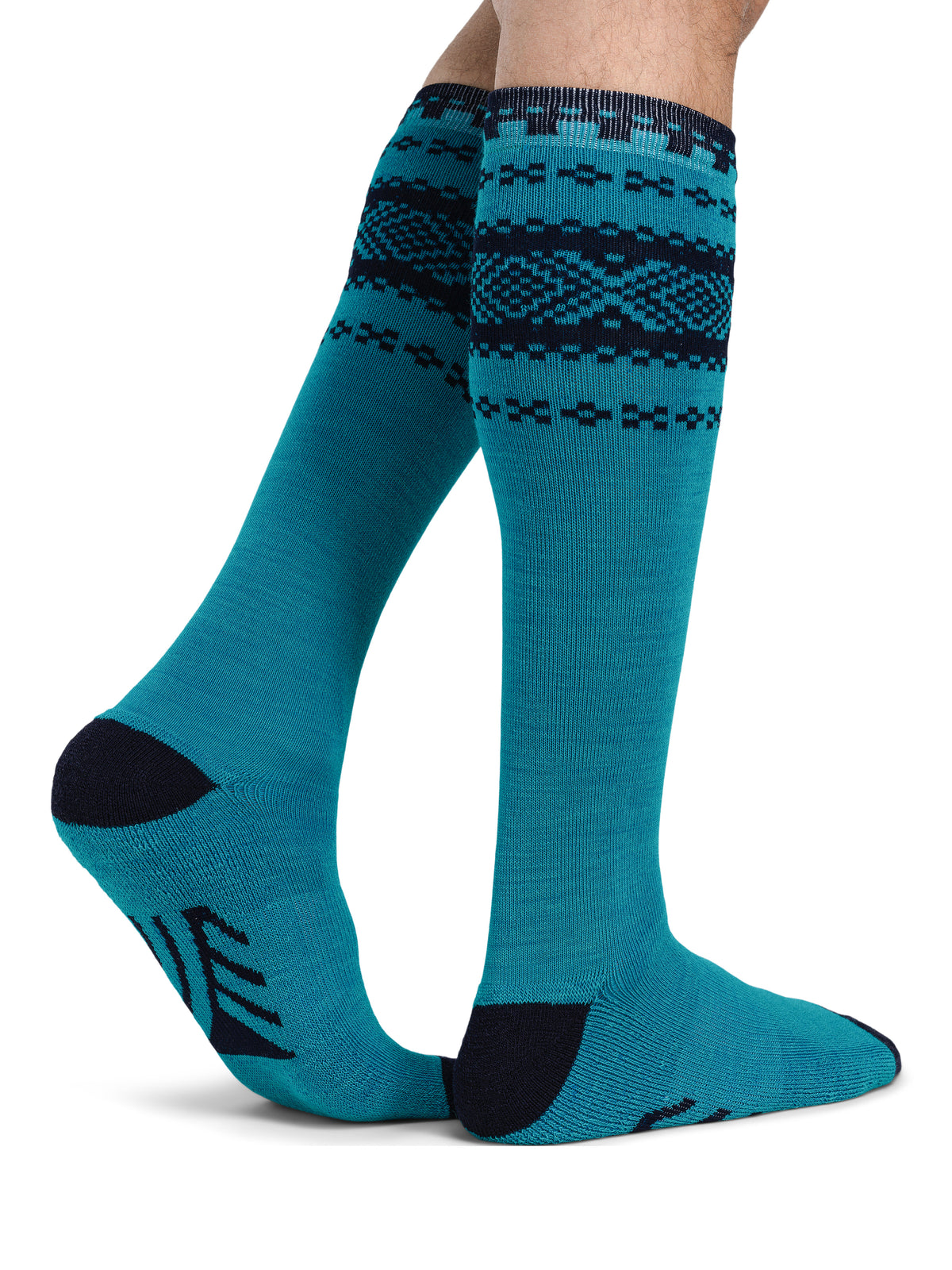 Dale of Norway Cortina unisex knee socks in turquoise and navy, pair shown on legs