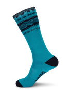 Dale of Norway Cortina unisex knee socks in turquoise and navy, single sock showing the tall cuff, heel and toe