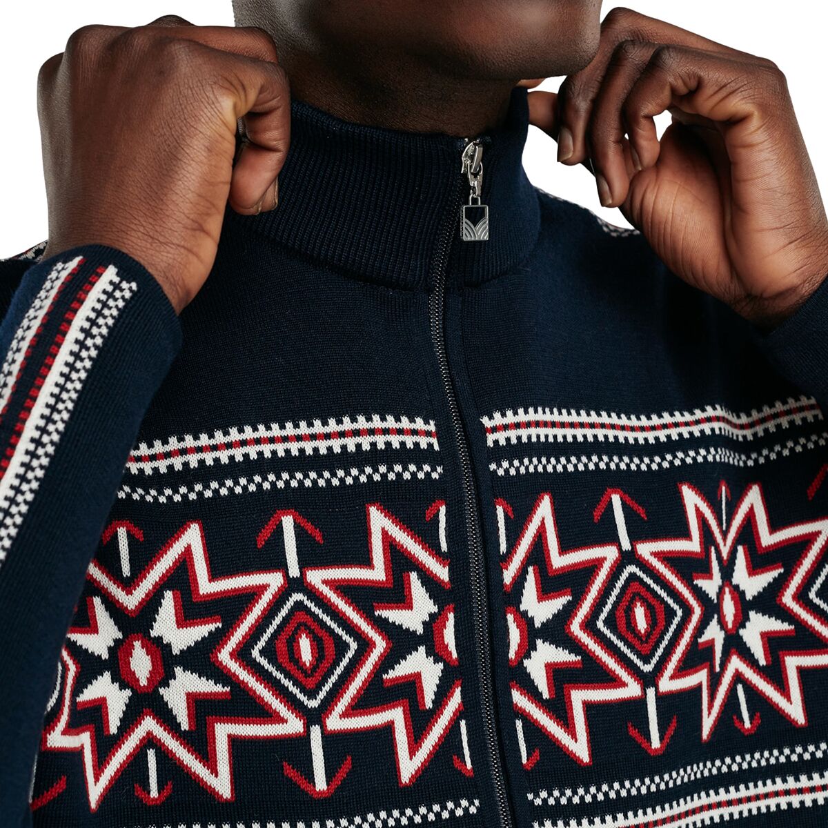 Close-up of the Olympia men's jacket's high collar, zipper, and Navy/Off White/Raspberry knit pattern